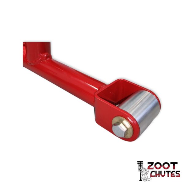Parachute chord bushing on the red C7 Parachute Mount. Logo of a dog in a zoot-suit in front of drag strip lighting text that says,"Zoot Chutes".