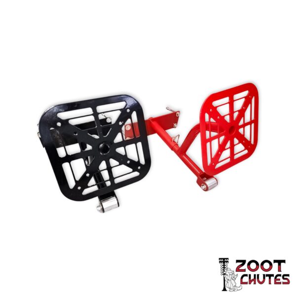 Front Side of Two C7 Parachute Mounts in the colors red and black. Logo of a dog in a zoot-suit in front of drag strip lighting text that says,"Zoot Chutes".